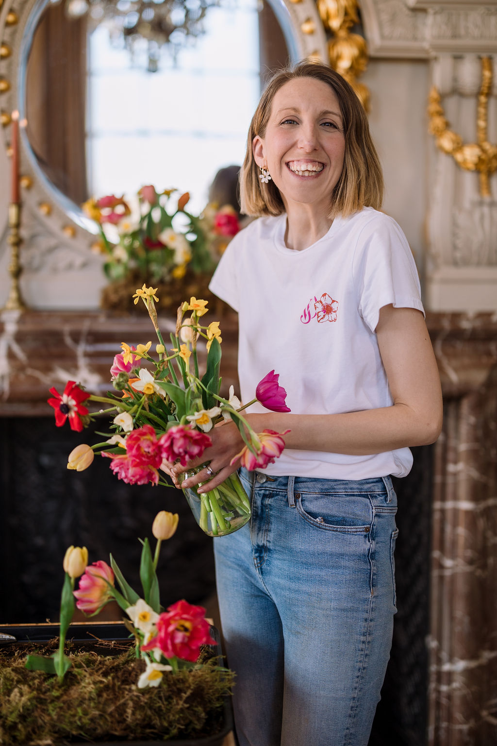 Vanessa Jayne Design Hampshire wedding florist holding seasonal flowers at a stansted house flower workshop