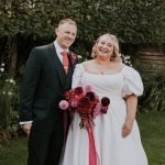 September wedding couple with seasonal flowers by sustainable florist Vanessa Jayne Design